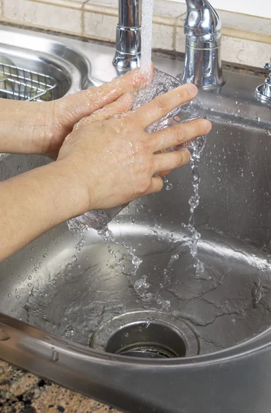 Rinsing Soap off of Drinking Glass — Stock Photo, Image