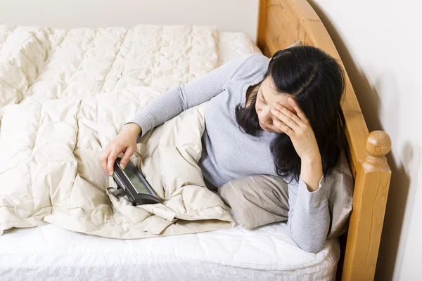 Mature woman restless in Bed — Stock Photo, Image
