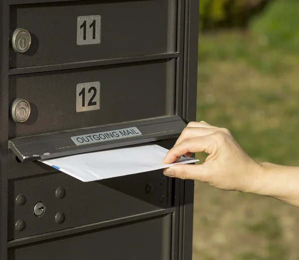 Sending letter to outgoing postal mailbox — Stock Photo, Image