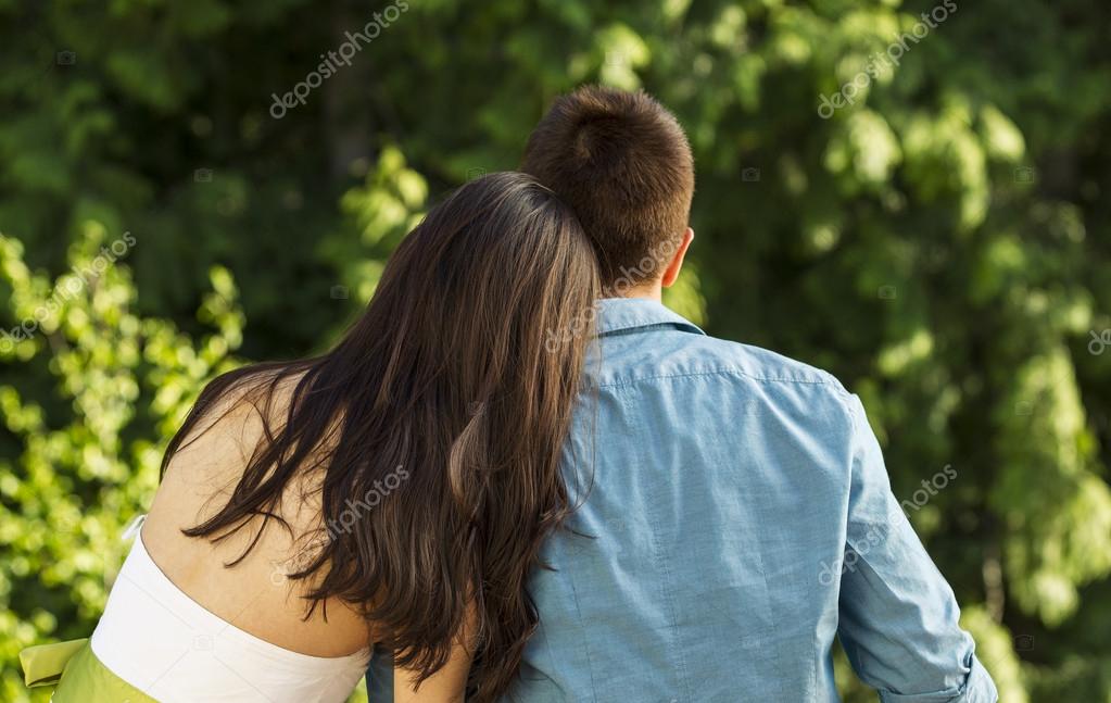 Young Adult Couple Enjoying The View Of Nature Stock Photo By.