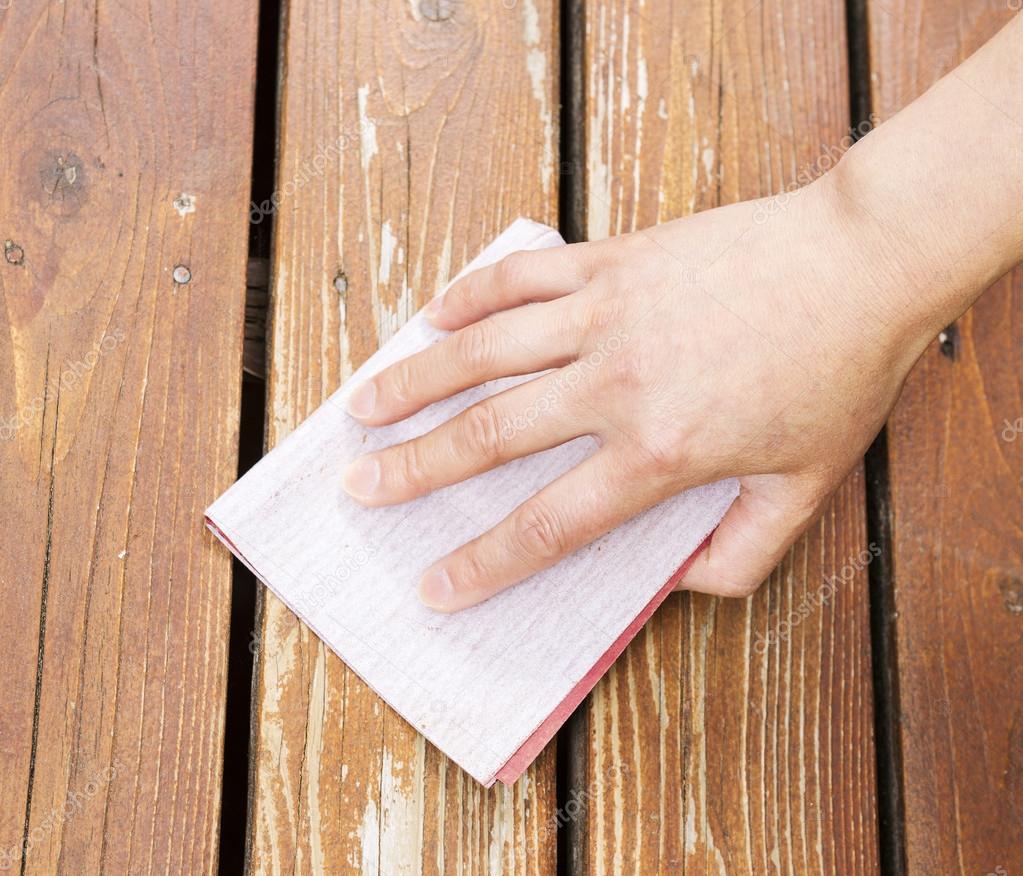 Female Hand Sanding Cedar Wood Deck Stock Photo By ©Tab62 25502183