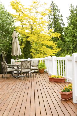 Outdoor Natural Cedar Deck with patio furniture clipart