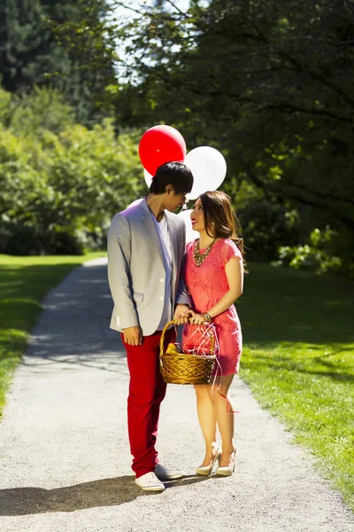 Young Adult Couple Looking into each others eyes while going on — Stock Photo, Image