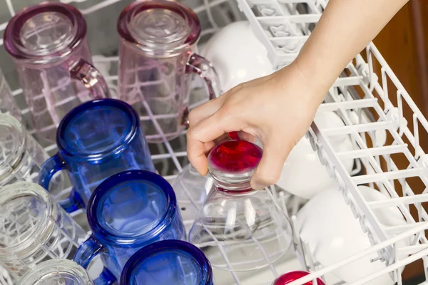 Loading the Dishwasher with glassware — Stock Photo, Image