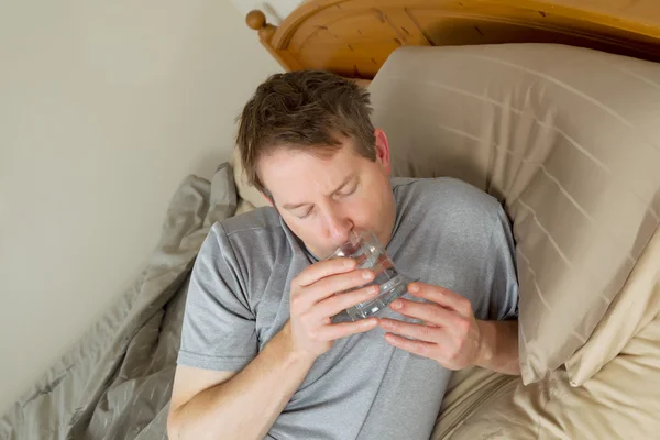 Sick Man Drinking Water — Stock Photo, Image