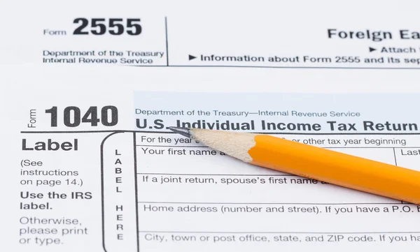 Tax Forms 1040 and 2555 — Stock Photo, Image