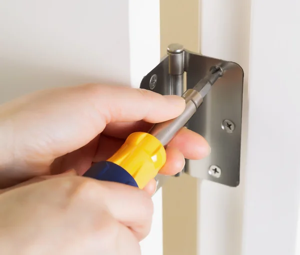 Fixing Door Hinge — Stock Photo, Image