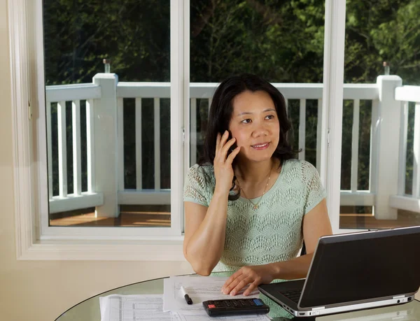 Mature woman working from home office — Stock Photo, Image