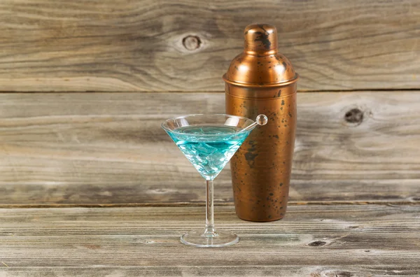 Refreshing Mixed Drink in Glass with Mixer in background on Rust — Stock Photo, Image