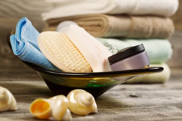 Spa Hygiene Accessories in Glass Bowl on Rustic Wood — Stock Photo, Image