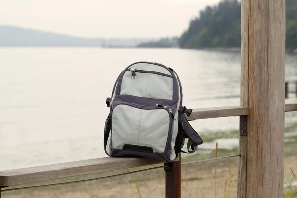 Backpack on Fence — Stock Photo, Image