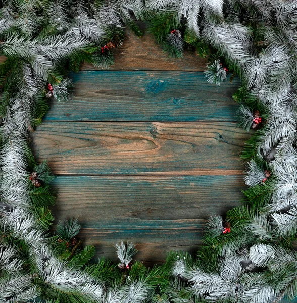 Όψη Στεφανιού Καλυμμένο Χιόνι Μικρά Κουκουνάρια Κυκλικό Περίγραμμα Μπλε Ξύλινες — Φωτογραφία Αρχείου