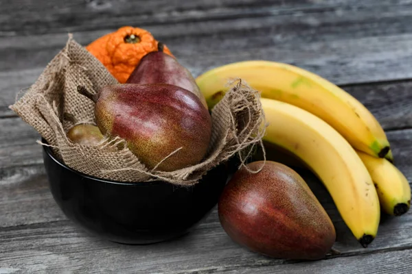 Ripe Fruit Consisting Pears Bananas Orange Old Wood Table Close — Stock Photo, Image