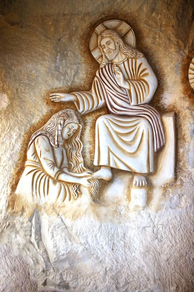 Барельєф на стіні в на храм Бога Хрест Стокова Картинка