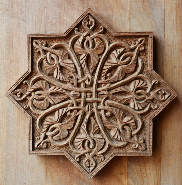 Ornament on wooden door — Stock Photo, Image