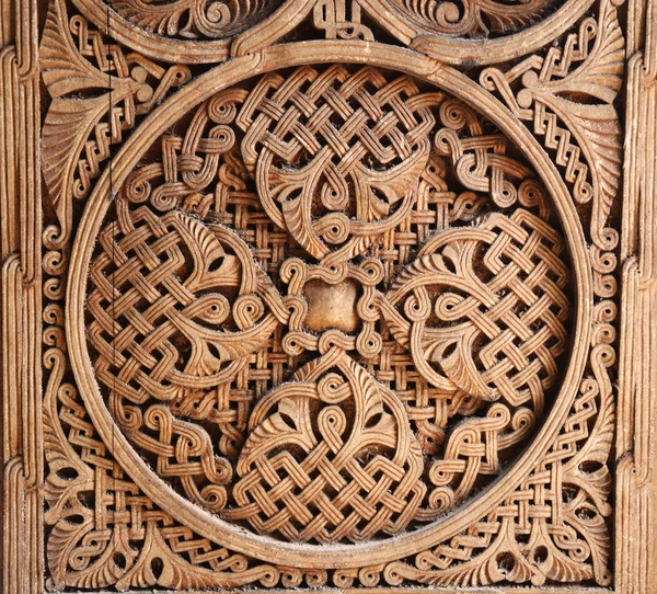Ornament on wooden door — Stock Photo, Image
