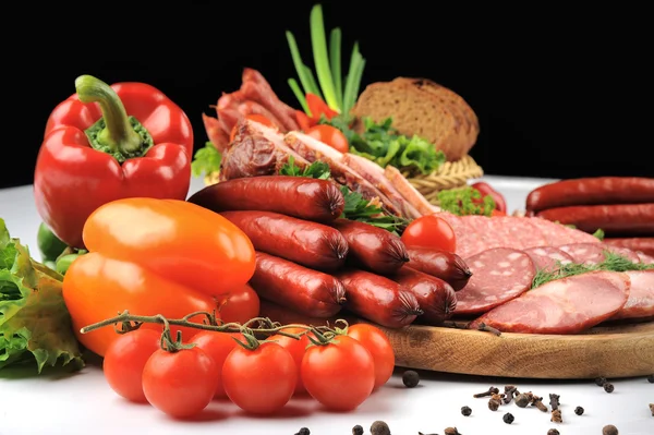 Sausages and vegetables — Stock Photo, Image