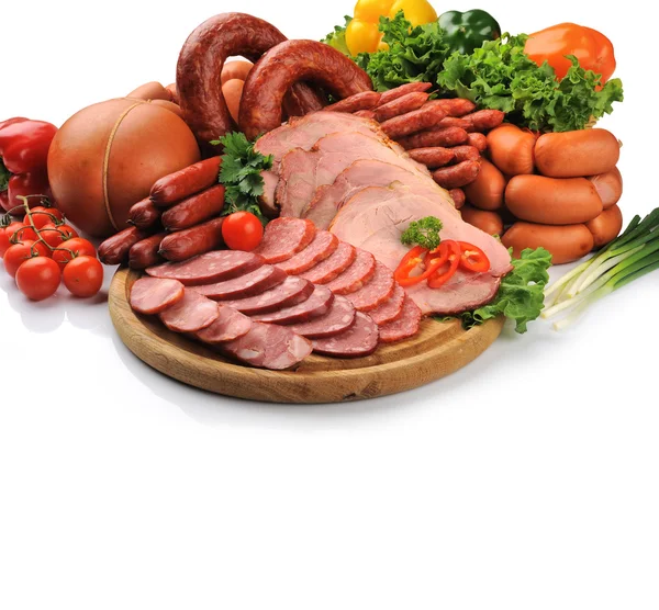 Сосиски, м'ясо та овочі — стокове фото