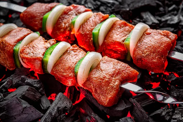 Fresh meat shish kebab cooked on charcoal — стоковое фото