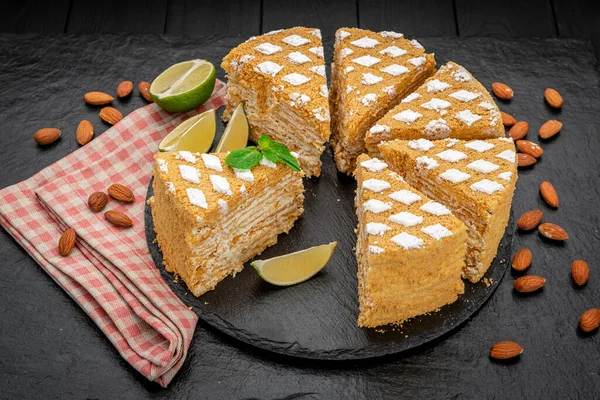 Delicious homemade honey cake on the table , dark background. Healthy food