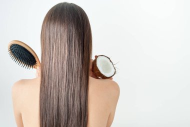 Hindistan cevizi yağına dikkat ederek mükemmel saç. Yüksek kalite fotoğraf