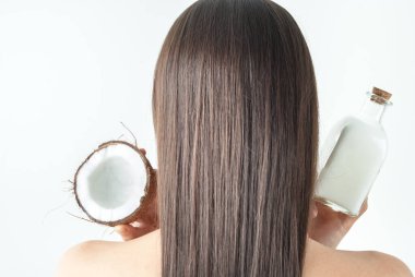 Hindistan cevizi yağına dikkat ederek mükemmel saç. Yüksek kalite fotoğraf