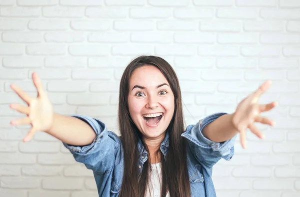 positive woman smiling on a light background. High quality photo