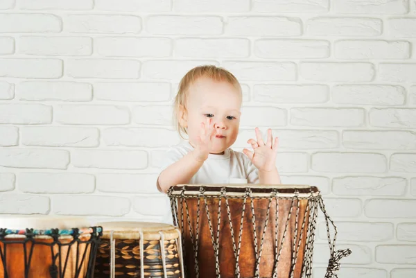 Cute Toddler Baby Playing Ethnic Drums Next Bricks Wall — Stock Photo, Image
