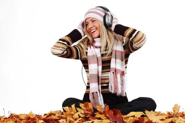 Autumn woman listening music Stock Photo