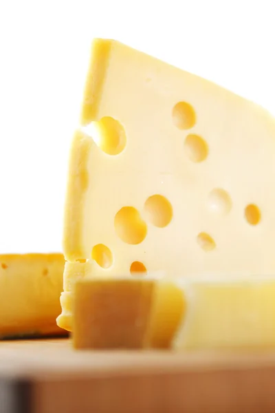 Cheese on a wooden table — Stock Photo, Image