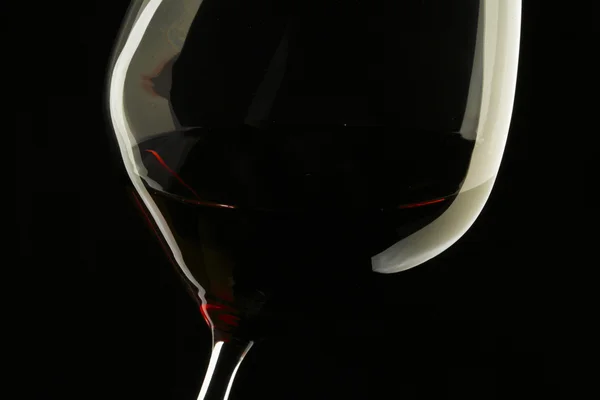 Ποτήρι κόκκινου κρασιού τύπου σιλουέτα μαύρο φόντο — Φωτογραφία Αρχείου