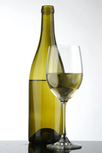 Bottle with white wine and glass — Stock Photo, Image