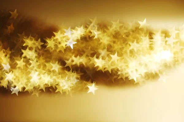 Estrela dourada bokeh fundo — Fotografia de Stock