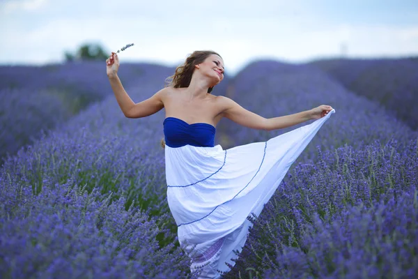Woman on lavender field Stock Photo