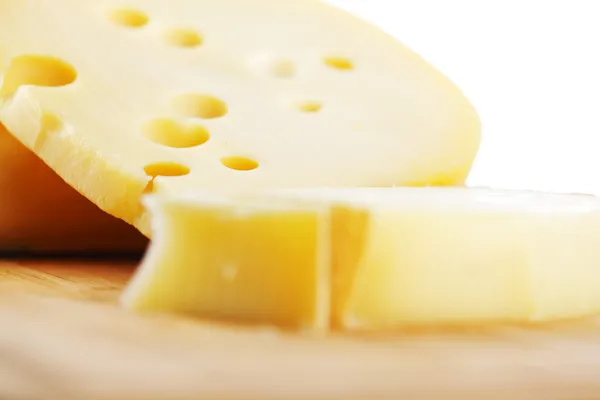 Cheese on a wooden table — Stock Photo, Image