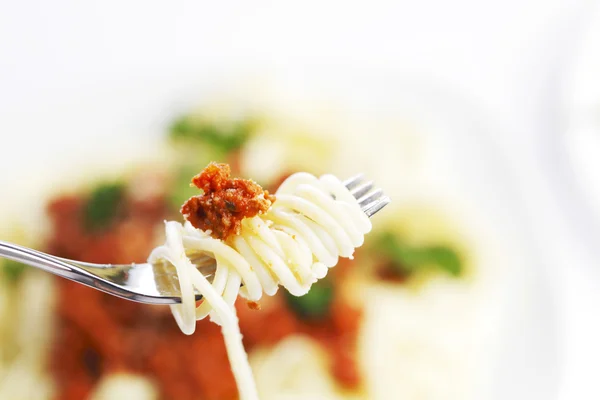 Spaghetti bolognese and fork — Stock Photo, Image