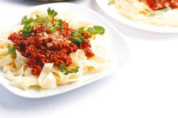 Plates with spaghetti bolognese — Stock Photo, Image