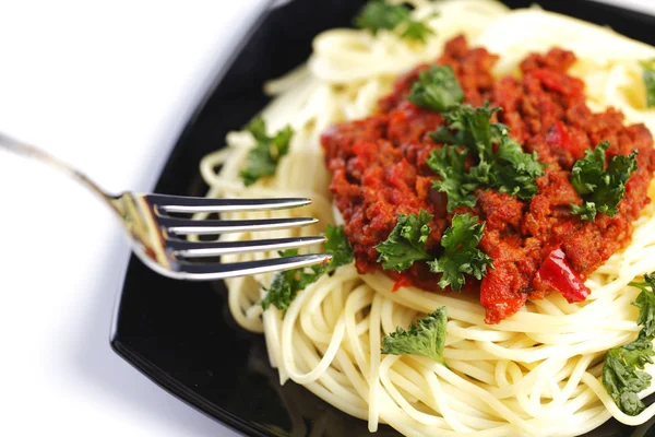 Spaghetti bolognese and fork — Stock Photo, Image
