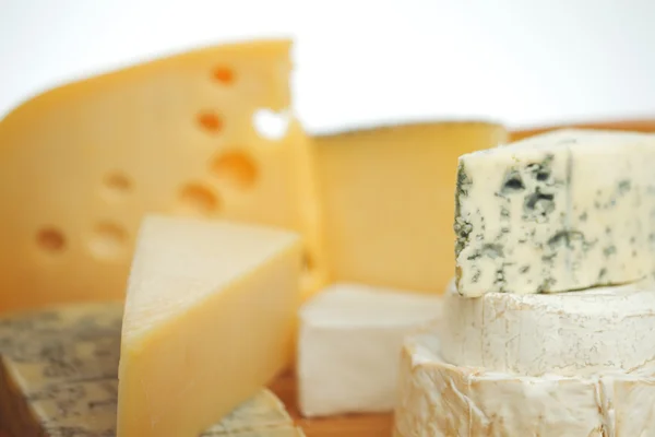 Cheese on a wooden table — Stock Photo, Image