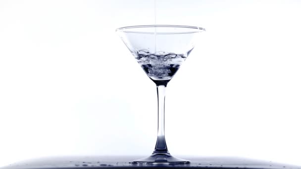 Filling glass with water isolated on white — Stock Video