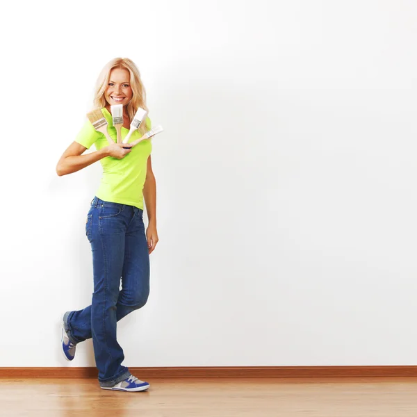 A woman with a brush — Stock Photo, Image