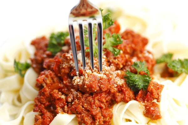 Spaghetti bolognese and fork — Stock Photo, Image