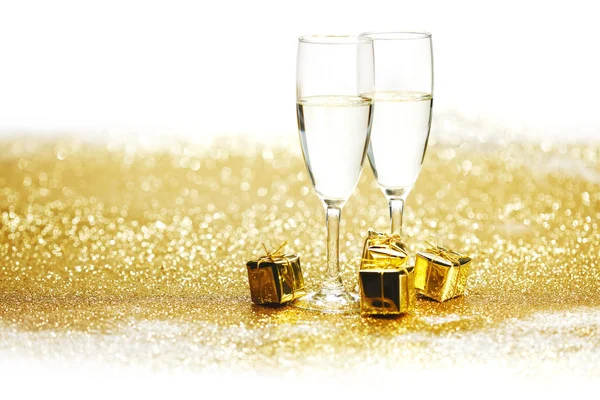 Champagne with christmas present — Stock Photo, Image