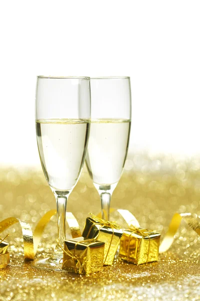 Champagne with christmas present — Stock Photo, Image