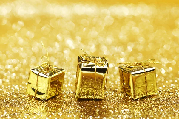 Golden christmas gifts — Stock Photo, Image