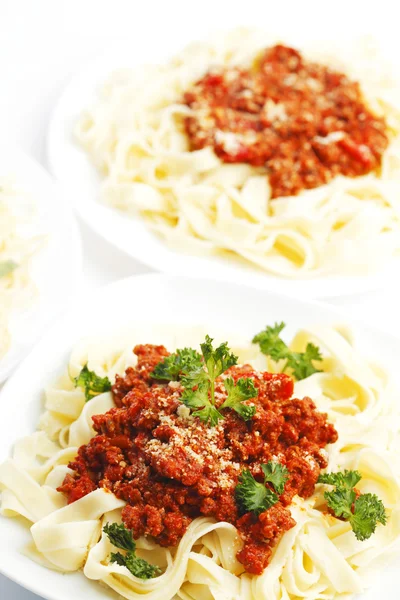 Plates with spaghetti bolognese — Stock Photo, Image