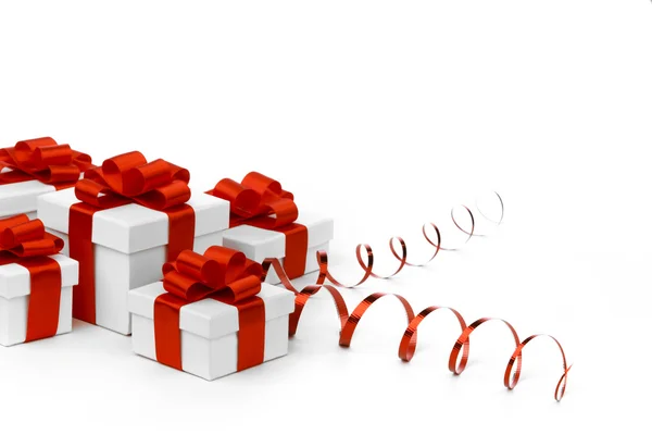 Cajas de regalo con arco rojo — Foto de Stock