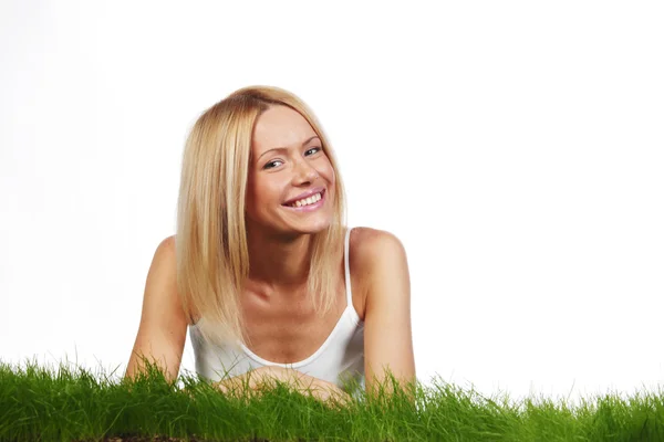 Vrouw opleggen van gras — Stockfoto