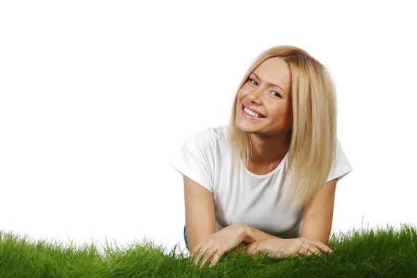Woman laying on grass Stock Picture