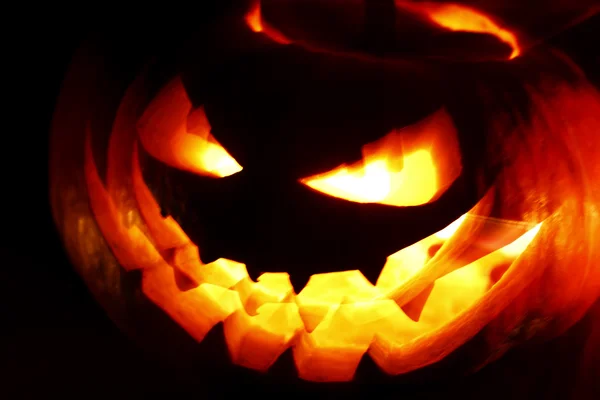 Glowing Halloween pumpkin — Stock Photo, Image